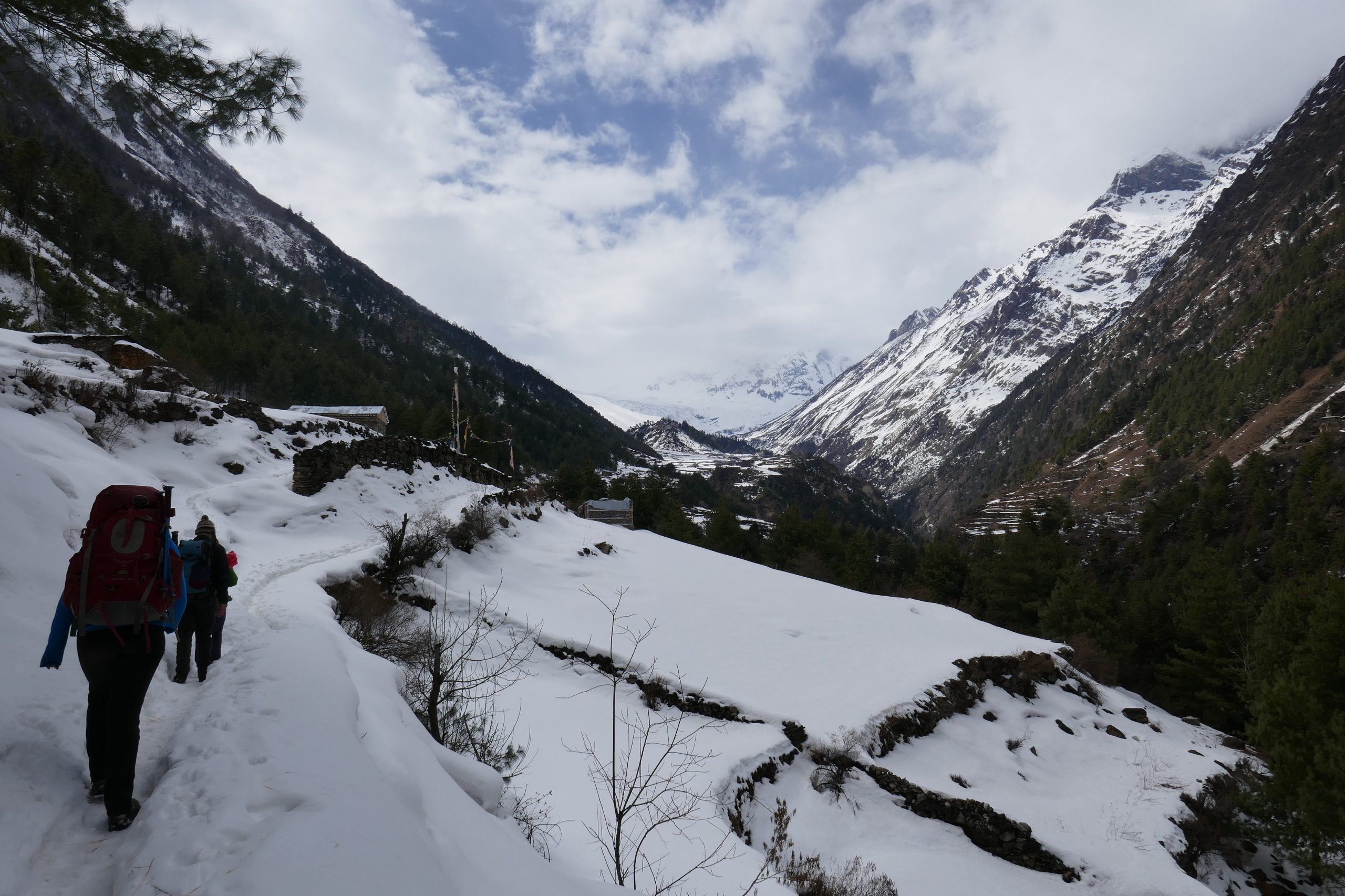 Snow covered Himalayan peaks, rugged trails, and traditional villages on the Manaslu Circuit Trek in Nepal.