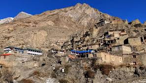 Scenic Himalayan peaks and traditional settlements along the Manaslu Nar Phu Valley Trek.